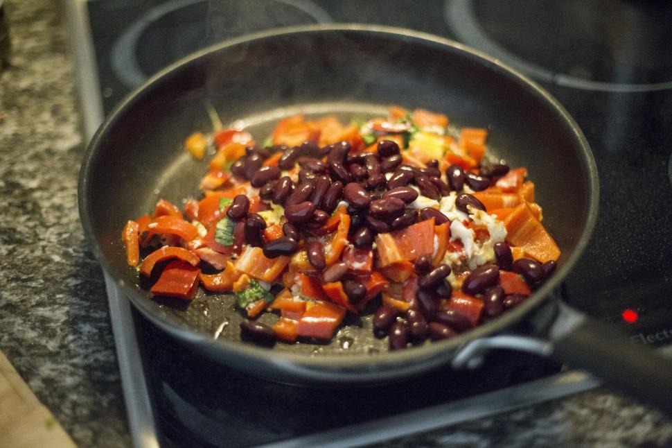 roasting vegetables and simmering beans